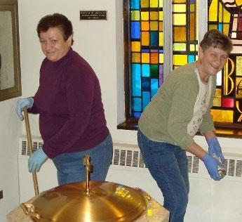 Page 8 Five Holy Martyrs Parish December 7, 2014 Bucket brigade prepares church - for the Lord