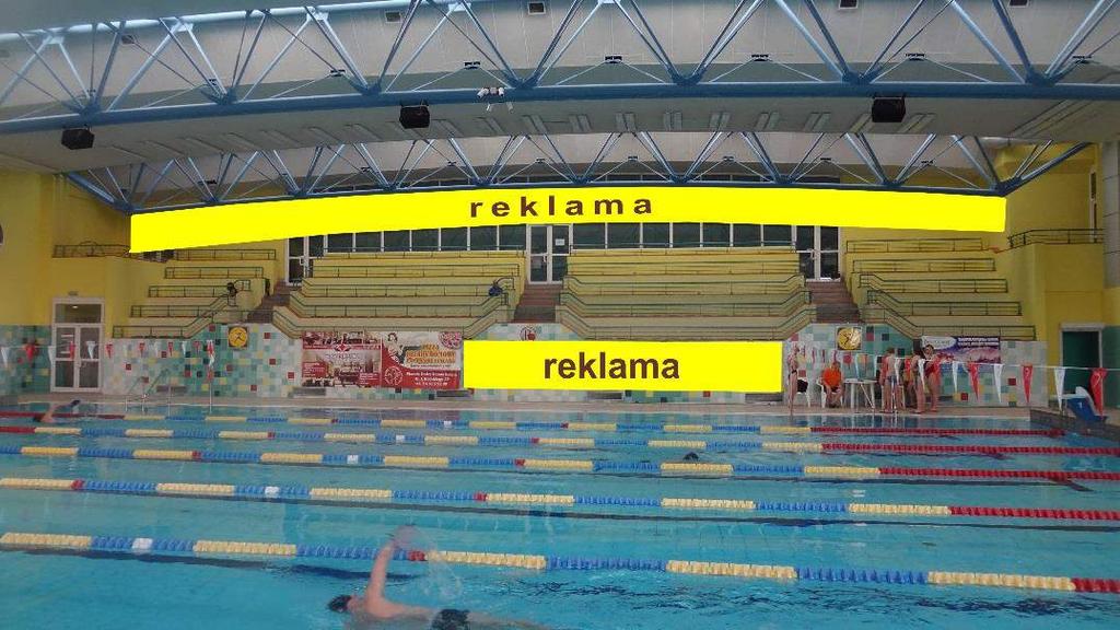 Strona 2 Pływalnia PODOLANKA Hala basenowa Banery reklamowe podwieszane nad trybunami Banery