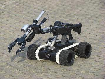 do rozpoznana terenu (b), sześcokołowy robot bojowy IBIS (c) Należy zauważyć, że mmo rozwjanych od welu lat metod modelowana ogumena pojazdów samochodowych, w przeważającej wększośc przypadków ne