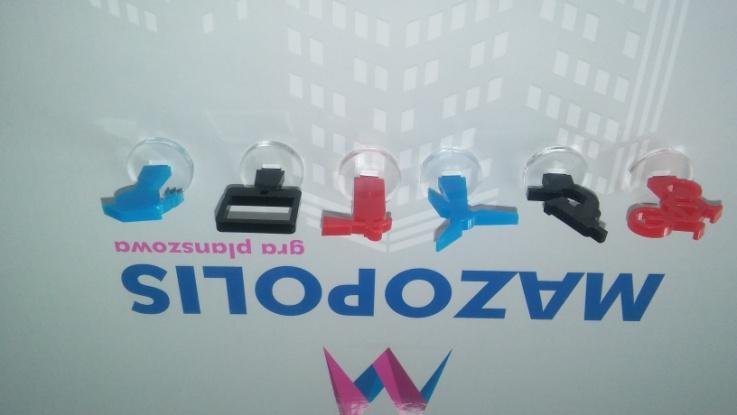 Uwaga. Zamieszczone powyżej zdjęcia przedstawia wygląd pionków, które posiada Zamawiający.