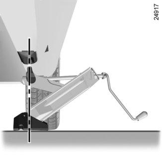 Zaparkować samochód z dala od ruchu drogowego, na płaskim, przyczepnym i twardym podłożu (w razie potrzeby pod podstawę podnośnika należy wsunąć deskę).