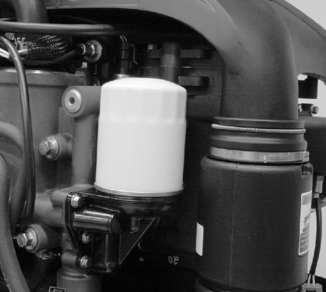 I 3. Odkręcić stary filtr kluczem do filtrów, obracając go w kierunku przeciwnym do ruchu wskazówek zegara. 14772 Klucz do filtrów oleju 91-802653Q02 ułatwia wymontowanie filtru oleju. 5221 4.