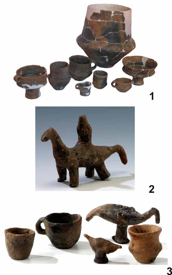 Fig. 6. Selection of pottery from the Bronze Age: 1 urns and accompanying artefacts at the cremation cemetery in Wieprzec, dist. Zamość, site 1. Photo by M. Piotrowski.