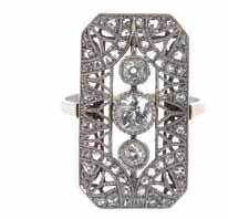 ~ 1,00 ct, rozety diamentowe, masa: 5,14 g Cena wywoławcza: 10 000 zł Estymacja: 14 000 20 000 8