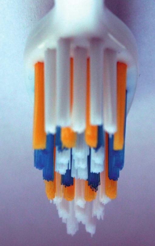 Toothbrushes used in the study: 1 Colgate 360o Surround medium, 2 Colgate