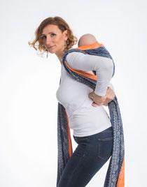 . Gather the loose material behind your back near child s neck and tighten the