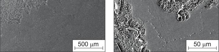 Rozpuszczanie ziaren fazy γ (a), (b). SEM Fig. 3. The microstructures on the boundary steel (X2CrNi 19-12) - liquid tin. Dissolution of the austenite γ grains (a), (b). SEM Rys. 4.