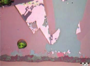 in the following section. The size of the area of reaction products which was obtained on the liquid drop / substrate interface is approx. 18 µm in the case of tests on unoxidised substrate (Fig.