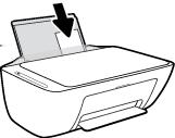 3. Wsuń stos papieru fotograficznego z prawej strony podajnika wejściowego krótszą stroną w dół i stroną do druku do góry, a następnie przesuń go w dół aż do oporu. 4.