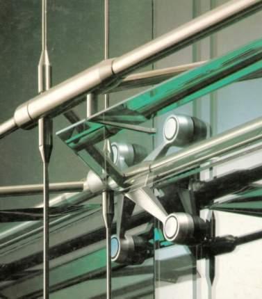 Rys. 3. Punktowy system mocowania tafli szklanych do konstrukcji pr towoci gnowej [1] Fig. 3. Bolt fixing of glass panels to steel cable structure [1] Rys. 4.