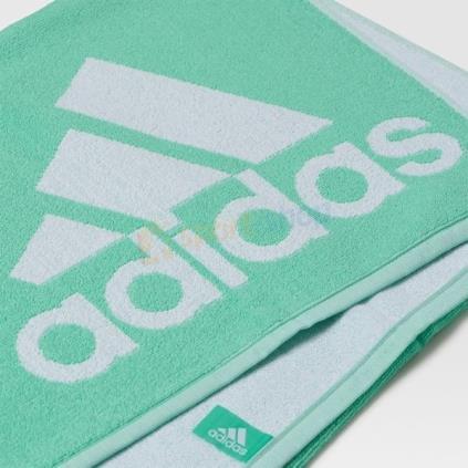 h) Ręcznik kąpielowy firmy Adidas rozmiar L szybko pochłaniający wilgoć po treningu i po prysznicu. Wymiary: 70 cm 150 cm. Tkanina frotte, 100% bawełna.