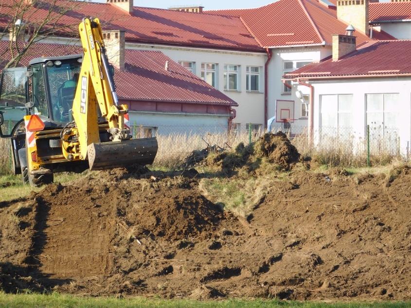 karczowaniem, zasypanie dołów, dowiezienie gruntu,