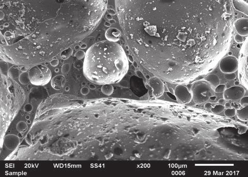 Macrostructure of foam glass (foaming at 950 C): a) mixture II (99% cullet, 1% carbon), b)