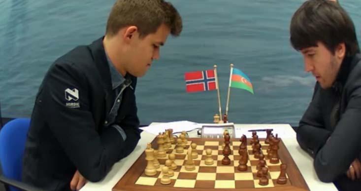 Radżabow (po prawej) Carlsen Krzysztof Puszczewicz Trwa IX runda Krzysztof Puszczewicz Pomny dwóch fatalnych partii w poprzednich rundach, polski super arcymistrz przyjął propozycję remisu, jaką