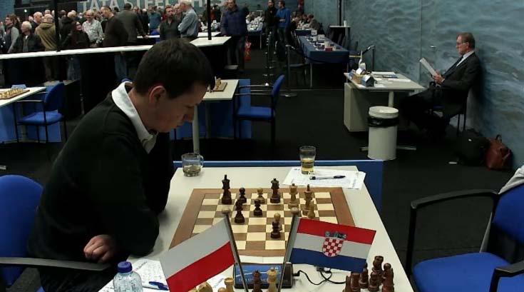858.Obrona królewsko indyjska [E91] GM Wojtaszek (Polska) 2744 GM Ding Liren (Chiny) 2732 1.d4 Sf6 2.c4 g6 3.Sc3 Gg7 4.e4 d6 5.Sf3 0 0 6.Ge2 Sa6 7.0 0 e5 8.Ge3 c6 9.d5 Sg4 10.Gg5 f6 11.Gh4 c5 12.