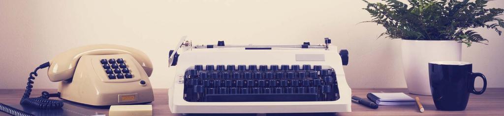 HISTORIA: Początki komunikacji biznesowej Stanowisko pracy w 1950 roku: Drewniane biurko z maszyną do pisania, retro telefon z bakelitu, ewentualnie dyktafon i kalkulator - tak wyglądało typowe