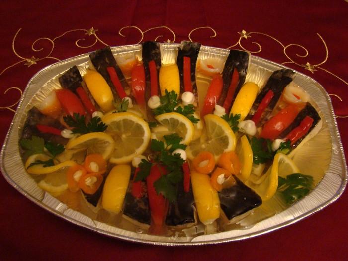 Carp in aspic Sebastian Dębosz, Vb a bunch soup vegetables (a carrot, parsley, celery, leek) 1kg carp 2 onions 5 tablespoons gelatin 1 glass white wine 4 grains allspice ½ lemon salt, sugar, pepper