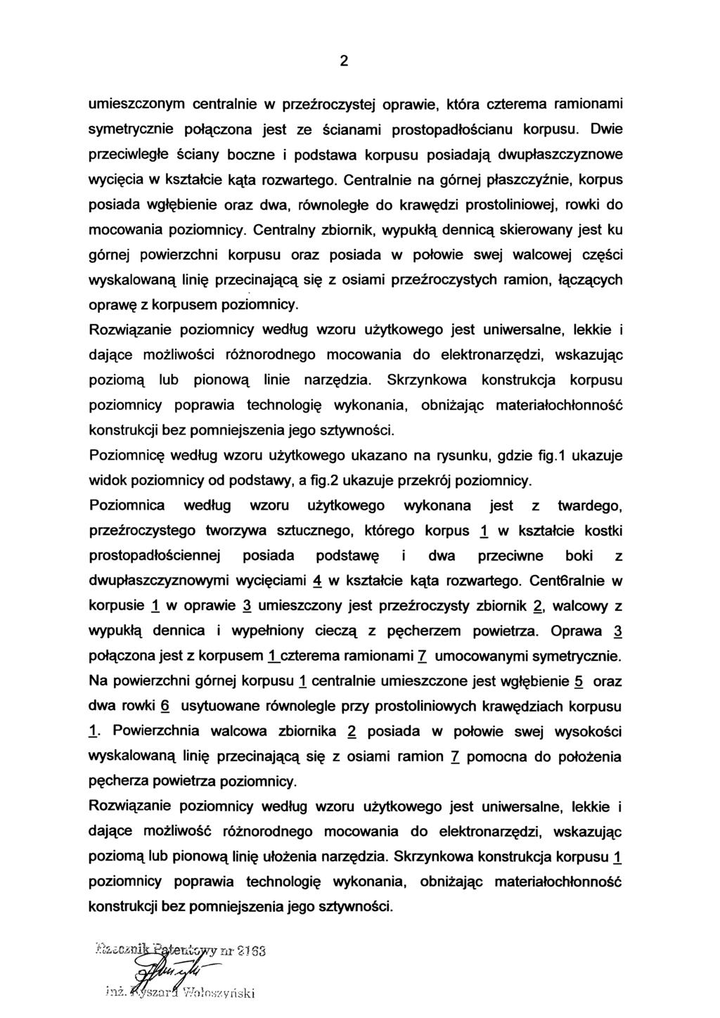 2 umieszczonym centralnie w przeźroczystej oprawie, która czterema ramionami symetrycznie połączona jest ze ścianami prostopadłościanu korpusu.