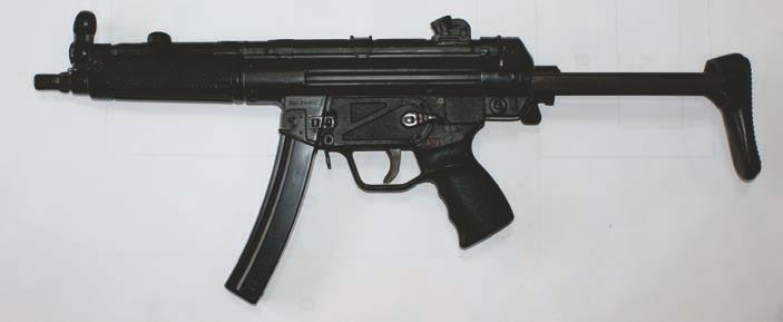 Fot. 13. Pistolet maszynowy MP-5 A3 3.1. Zasada działania Działanie pistoletu maszynowego oparte jest na zasadzie wykorzystania energii odrzutu zamka półswobodnego.