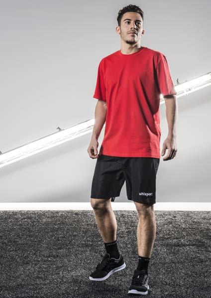 w pasie elastyczny ściągacz ze sznurkiem zapinane kieszenie posiadają podszewkę spodenki treningowe nadruk uhlsport ESSENTIAL SPODENKI ESSENTIAL WOVEN treningowe z wewnętrzną