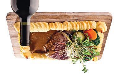 STEKI / STEAKS Stek z polędwicy wołowej na desce z warzywami i zapiekanymi ziemniakami (sos pieprzowy lub Bernaise) 69,- Beef sirloin steak on board with vegetables and roasted potatoes (pepper sauce