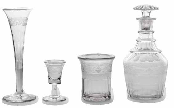 27 Zestaw czterech szkieł Wołyń (?), XVIII/XIX w. w zestawie: karafka (wys. 19,5 cm), szklanka (wys. 9 cm), kieliszek flet (wys. 18,5 cm), kieliszek do nalewek (wys.