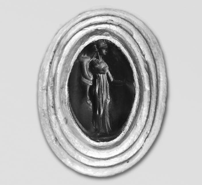 It was made of a dark red agate, a stone often used for ancient gemstones, carved with an image of Artemis in relief.