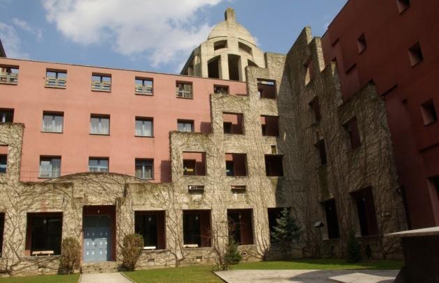 THE SEARCH FOR MODERN AND INNOVATIVE FORMS IN POLISH SACRED ARCHITECTURE BASED ON STRUCTURAL,... Behind the wall is irregular courtyard ( Courtyard of Desire ) with gates leading to nowhere.
