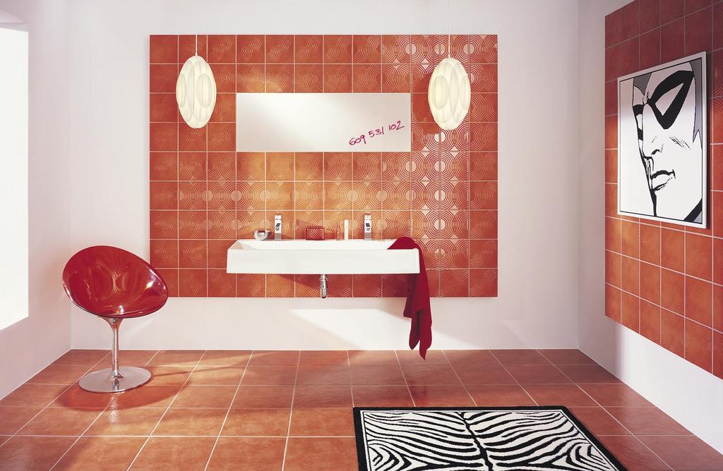 Majolika dekoracje Punto Wszechobecna geometria. IntensywnoÊç kolorów podkreêlajàca faktur dekoracji. Łazienka nawiàzujàca swojà stylistykà do sztuki pop-artu.