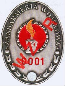 Wzór nr 7 do 18 ODZNAKA IDENTYFIKACYJNA ŻOŁNIERZA ZAWODOWEGO Uwagi: Odznaka ma kształt owalny o wymiarach 70 x 50 mm. Jest koloru srebra oksydowanego.