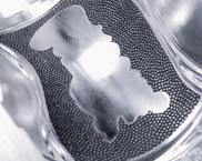 900, lasertec 210 Shape Frezowanie & strukturowanie laserem połączone na jednej obrabiarce 01 Implant 13-elementowego mostku