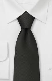 This tie matches your suit. Ten krawat pasuje ci do garnituru. I bought him a tie. Kupiłem mu krawat.