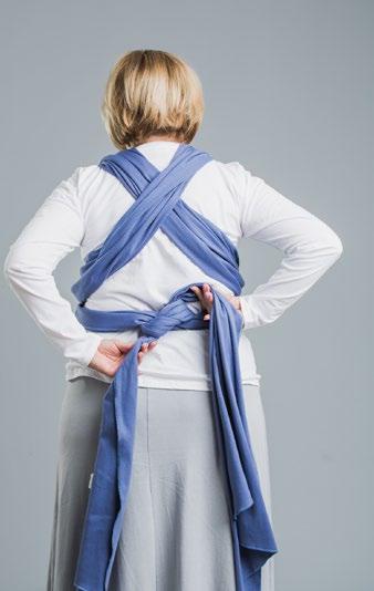 Securely holding your baby all the time, place your baby on your