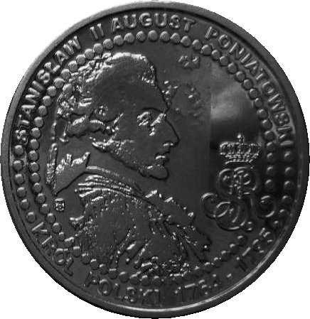 Wreszcie medal w kształcie wydłużonej elipsy, w trzech frakcjach,
