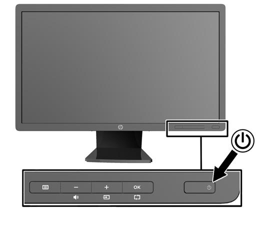 2. Włącz monitor, naciskając przycisk zasilania znajdujący się na jego panelu przednim.