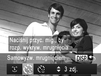 Szczególne scenerie Korzystanie z funkcji samowyzwalacza mrugnięciem Nakieruj aparat na fotografowaną osobę i naciśnij do końca przycisk migawki.