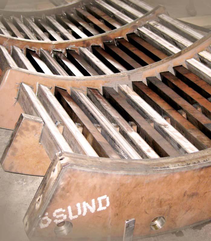 A B TITAN AMERICA UNIKA STRATY 50 000 $ Titan America, wiodący producent cementu i materiałów budowlanych w USA, był zaniepokojony, że przekładki międzyzębne oraz osłony boczne łyżki mogły ulec