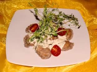 Pierogi Dumplings Pierogi orkiszowe z łososiem i twarogiem podawane z sosem cytrynowo-koperkowym (7sztuk) wyrób własny Spelled homemade dumplings with salomon, cottage cheese and lemon-dill sauce