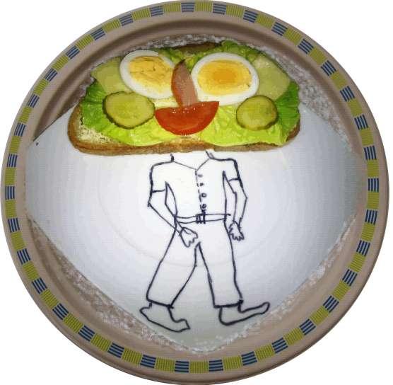 Drugie śniadanie Piotrka Kanapkowy człowiek - chleb jasny - żółty ser - szynka - pomidor -