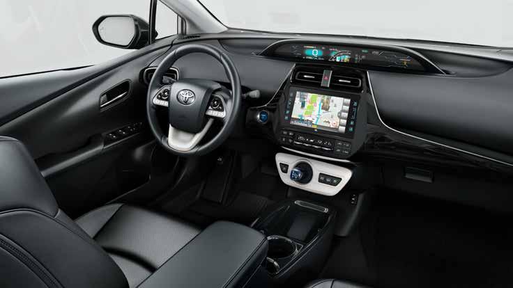 Komfort Premium Prestige Klimatyzacja automatyczna dwustrefowa Nawiewy klimatyzacji z tyłu Możliwość zaprogramowania klimatyzacji podczas ładowania samochodu Kamera cofania Podłokietnik przedni ze