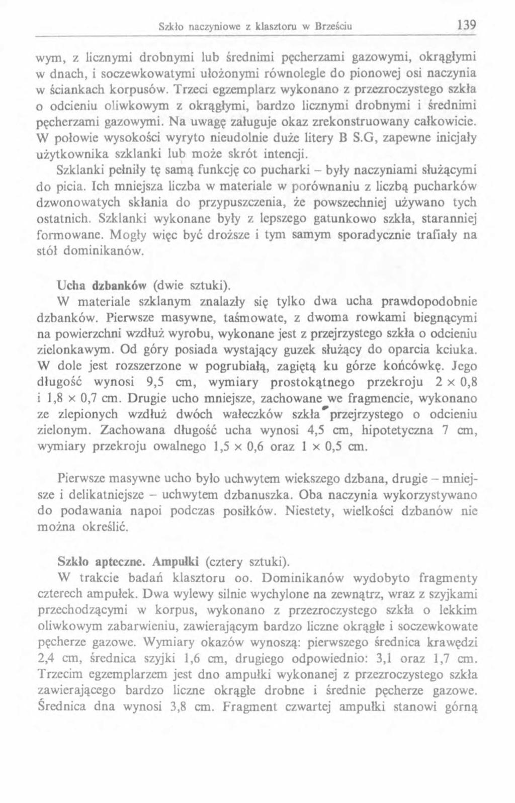wym, z licznymi drobnymi lub średnimi pęcherzami gazowymi, okrągłymi w dnach, i soczewkowatymi ułożonymi równolegle do pionowej osi naczynia w ściankach korpusów.