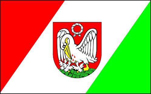 Pelikan pochylając się, karmi swoje trzy małe, białe pisklęta ze złotymi dziobami i nogami trzema czerwonymi kroplami krwi, które wyciekają z piersi.