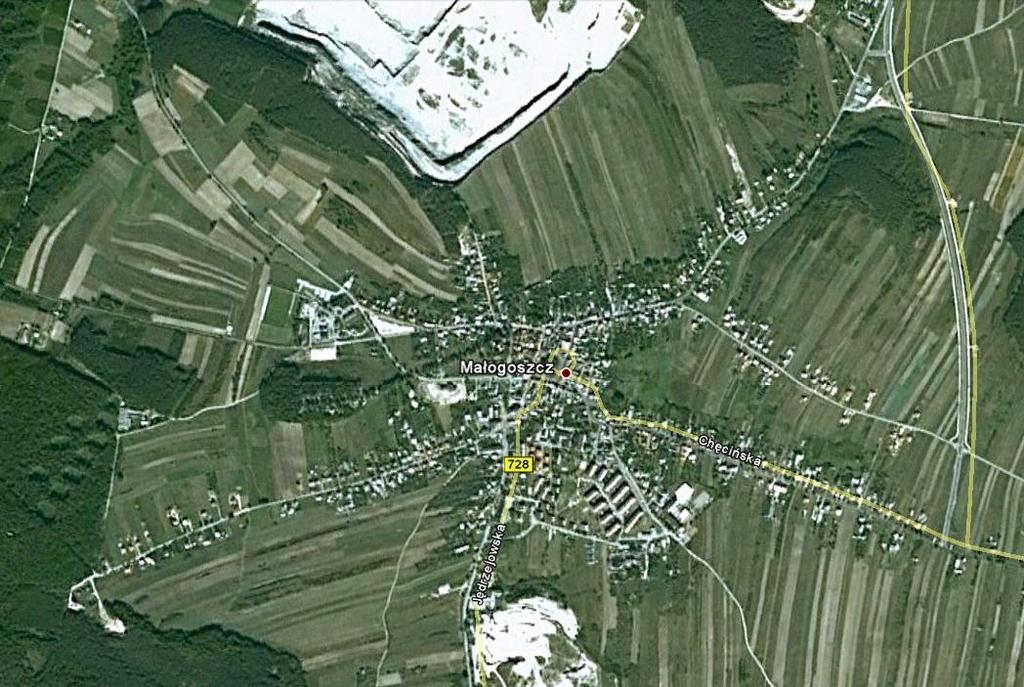 Rysunek B-4. Lokalizacja stacji pomiarowej w miejscowości Małogoszcz przy ul 11-go Listopada 25 Właścicielem stacji pomiarowej w Małogoszczy przy ul. 11-go Listopada jest Lafarge Cement S.A.