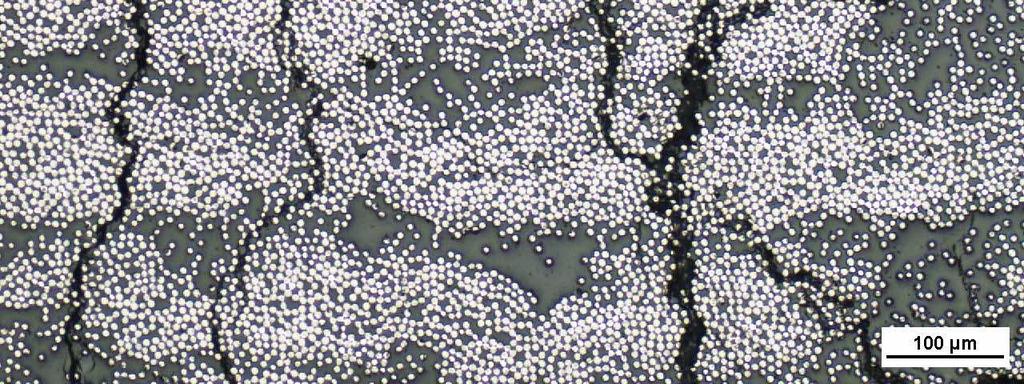 section, c) microstructure cross-section a) b) Rys.6.