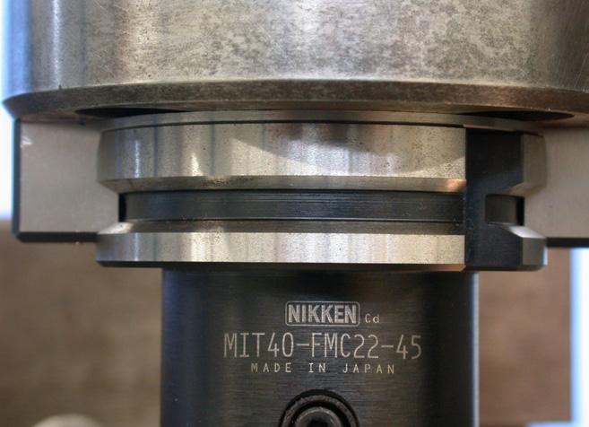 =1,54 mm, po zaciągnięciu uchwytu do wrzeciona: l z =1,37 mm. a) b) l o =2,11 mm l o = mm Rys. 3.