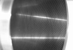 The order of microhrdness in the zone of internl nitriding fter lser impulse bem tretment: 1 zone glow dischrge nitriding of phses ε + γ, zone fter lser bem tretment ) 1 wnętrznego w środkowej