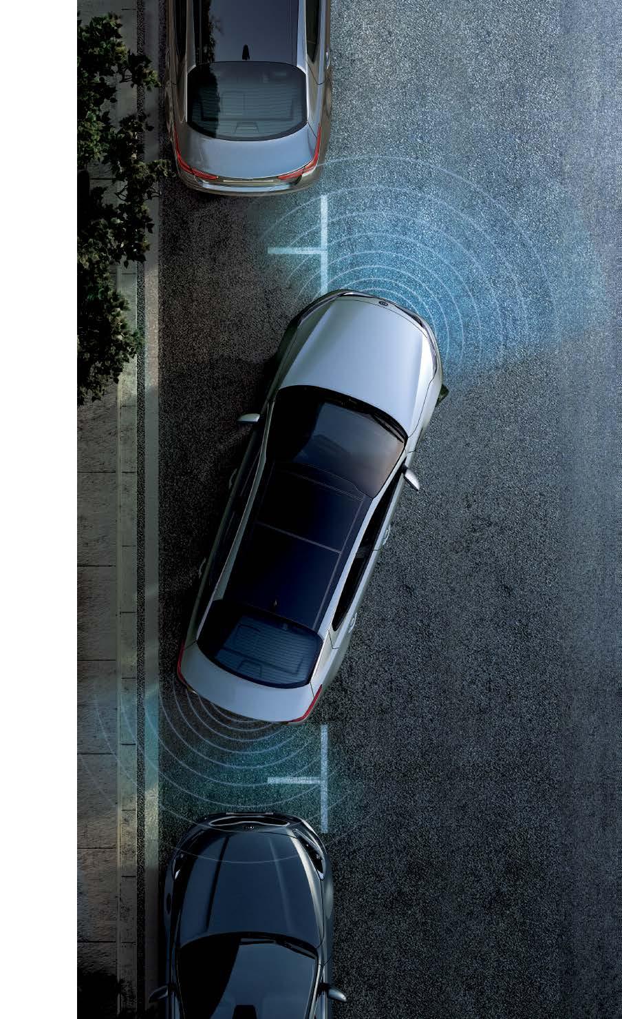 Asystent parkowania równoległego (Kia Auto Park Assist) Ten inteligentny układ wyręcza kierowcę podczas parkowania.