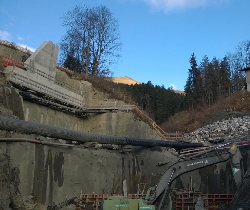 The stream water was by-passed using a temporary piping (black pipe visible