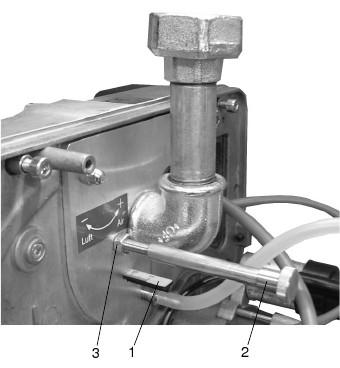 Uruchomienie Uruchomienie Po zakończeniu instalacji i prac montażowych, palnika może zostać oddany do eksploatacji Nastawa ilości powietrza 1- Skala "A" 2- Śruba