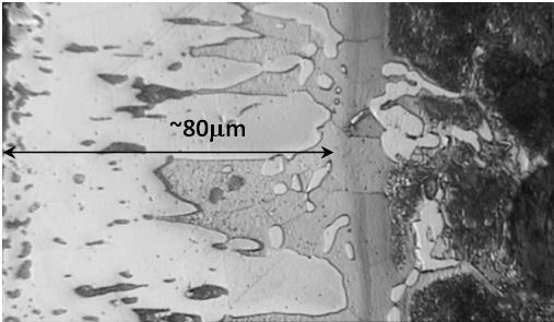 It was especially visible in the vicinity of the border with non-remelted material during treatment. Some graphite nodules (partly diluted) stayed in the boronized zone.